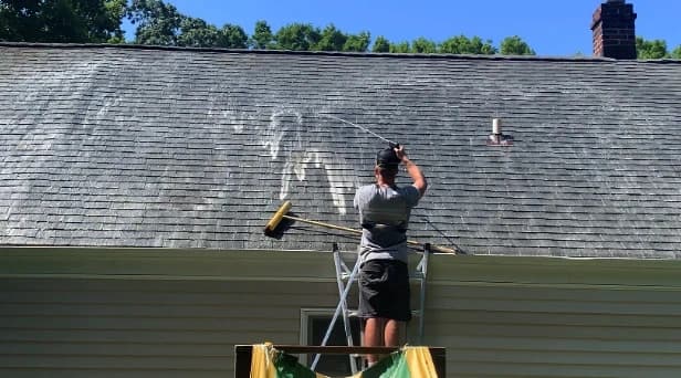 Before and after results of roof washing by Aurora Power Washing in Aurora